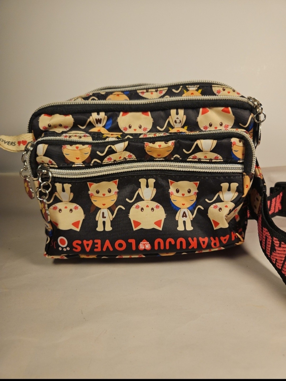 Harajuku Lovers Black Cat Print Crossbody Bag with Cream & Red Accents
